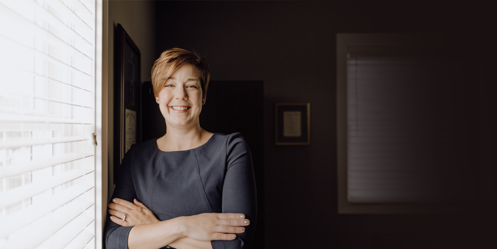 Attorney, Andrea Henning standing in her office in Lima, Ohio