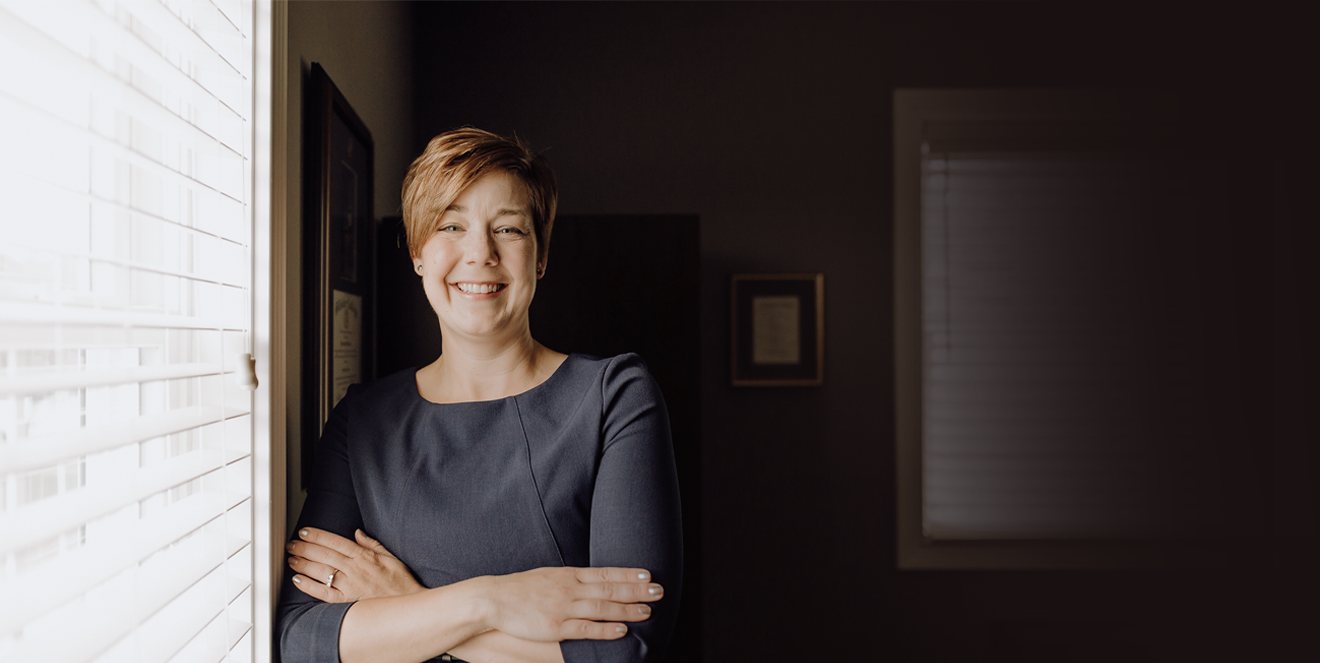 Attorney, Andrea Henning standing in her office in Lima, Ohio